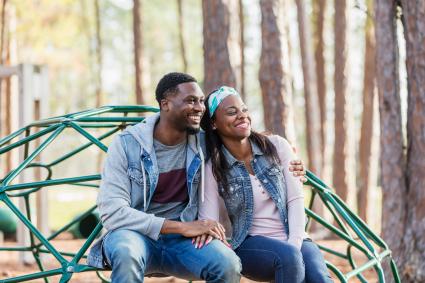 Couple hanging out at playground