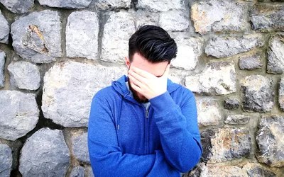 Portrait Of A Young Man Standing Outdoors