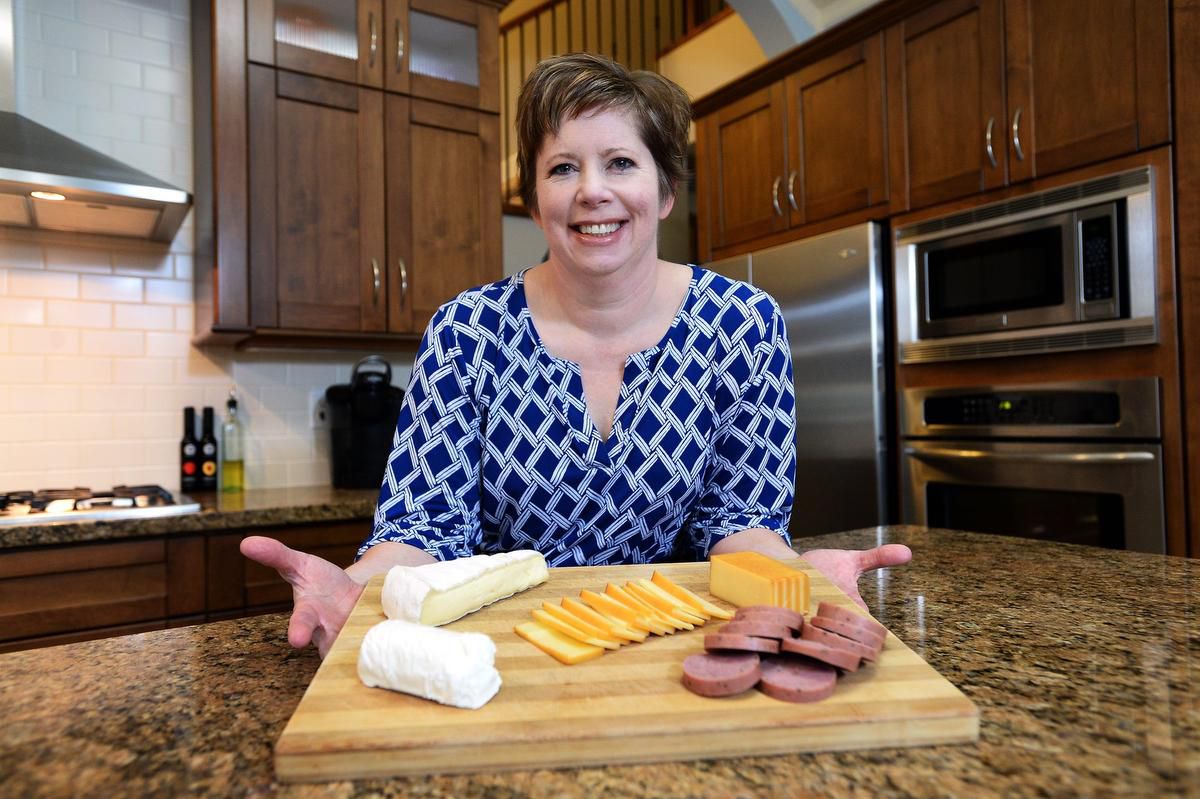 Pathologist Dr. Barbra Allen Bradshaw, seen in her Abbotsford, B.C., kitchen on Dec. 28, is part of a group of doctors from across the country who have been on a crusade to change the way Canadians are told to eat — urging colleagues and regular Canadians alike to eat fewer carbohydrates than what's recommended by the government and indulge in fat from sources such as steak and cheese.